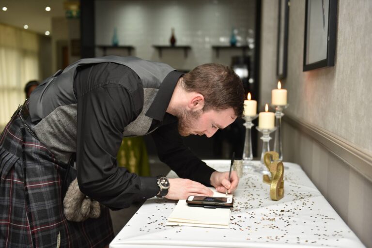 JGrahamPiper writing in guest book