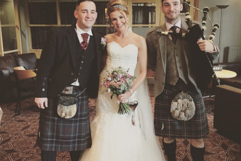 Jg piper with bride & groom wedding