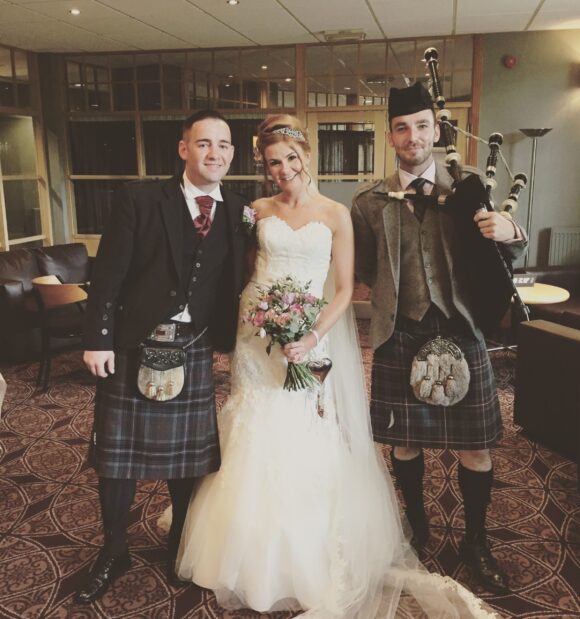 Jg piper with bride & groom wedding